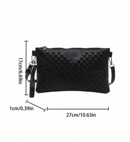 BOLSO NEGRO CON TACHES NEGROS