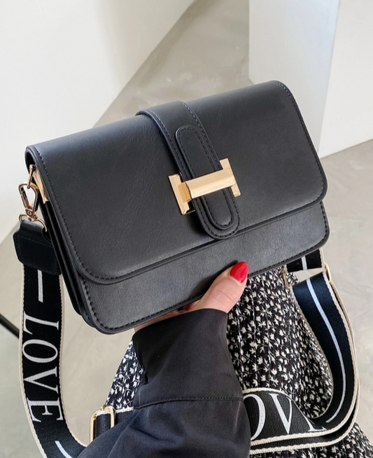 BOLSO NEGRO HEBILLA ELEGANTE