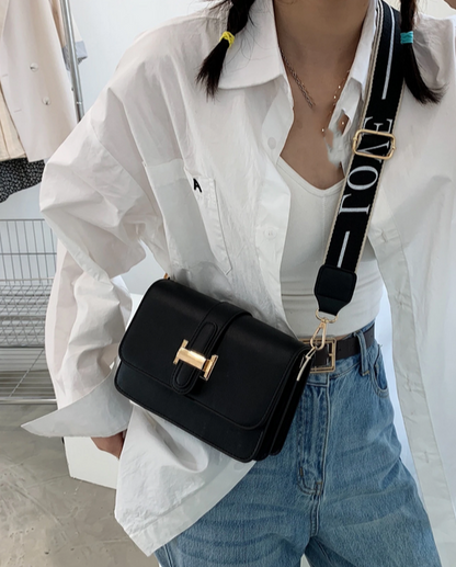 BOLSO NEGRO HEBILLA ELEGANTE