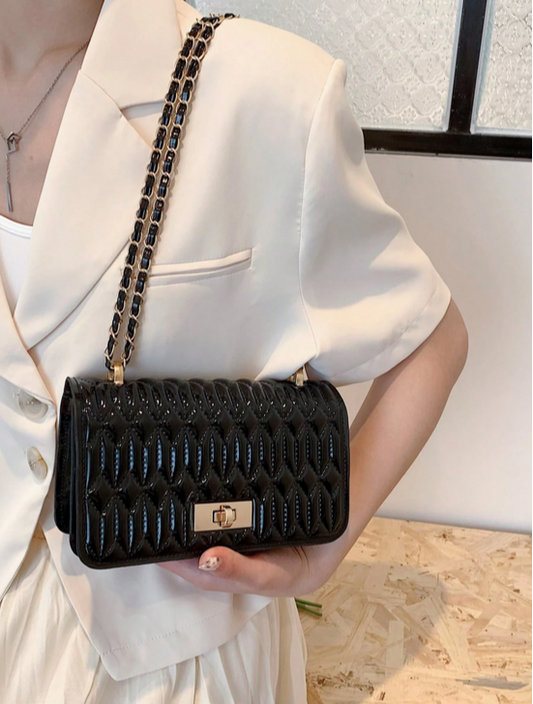 BOLSO NEGRO DISEÑO ALTO RELIEVE