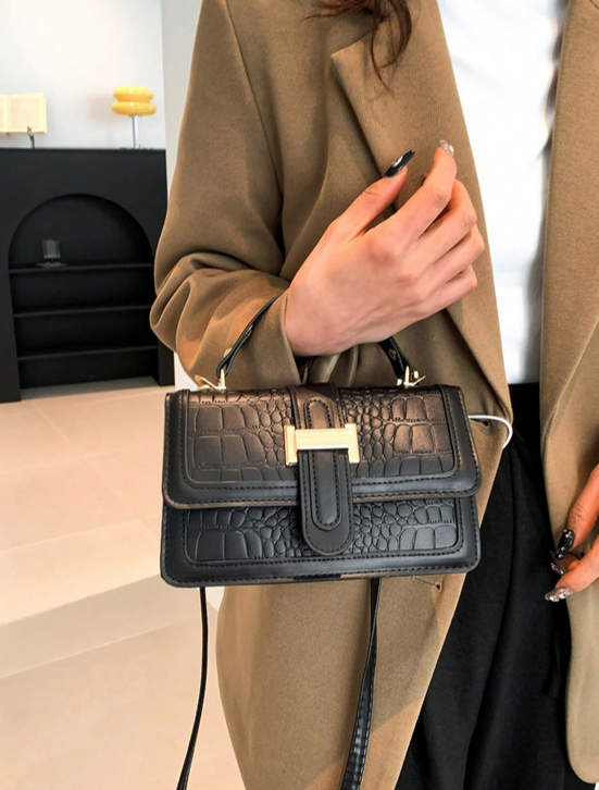 BOLSO NEGRO HEBILLA, IMITACION PIEL DE COCODRILO