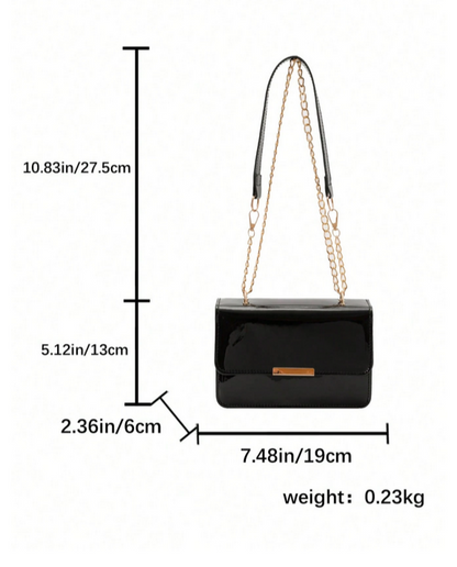 BOLSO NEGRO SOLAPA CON PLATINA DORADA