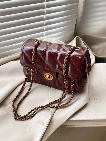 BOLSO BURDEOS ACOLCHADO
