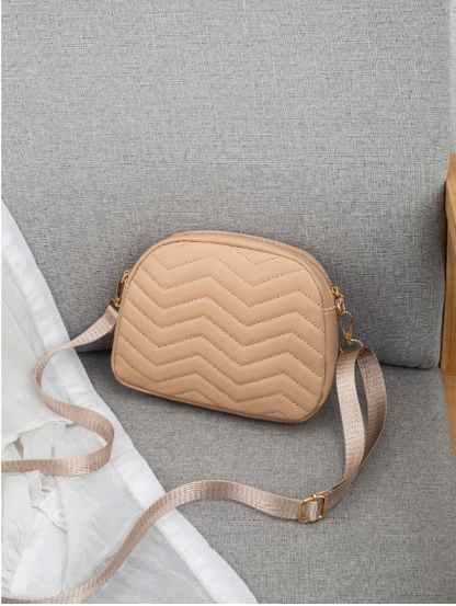 BOLSO CAQUI CON PLACA DORADA