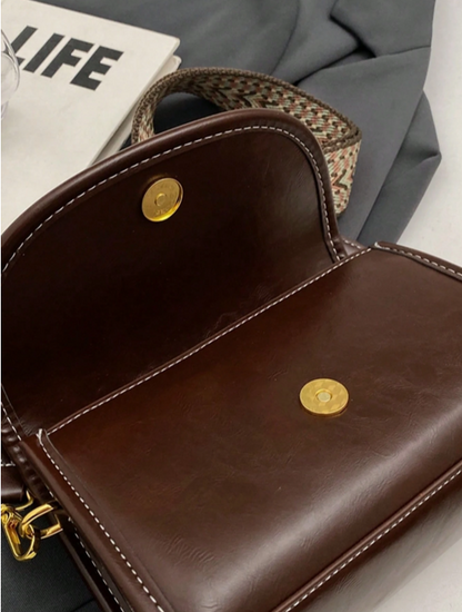 BOLSO MARRON CORREA TEJIDA