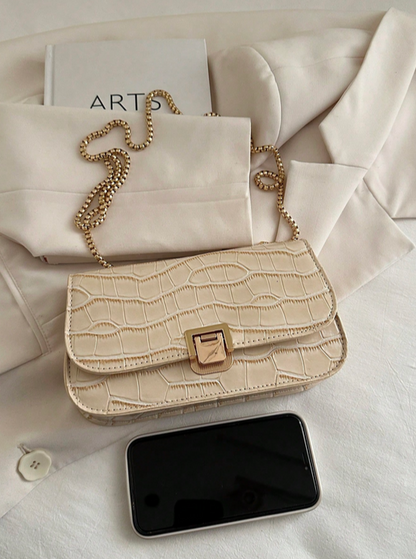 BOLSO BEIGE EN RELIEVE CON CADENA DORADA